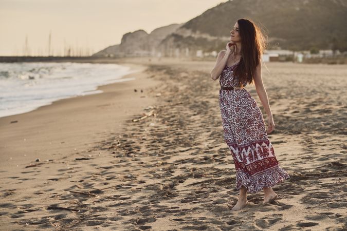 Woman with dress at the beach