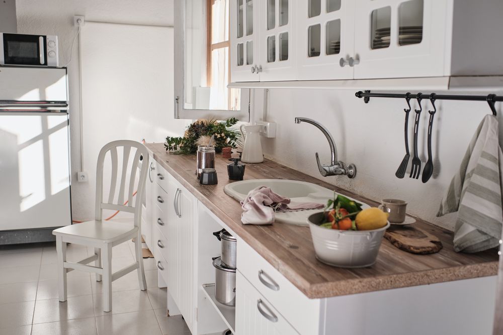 Interior of stylish modern white kitchen