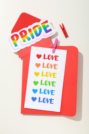 Pride parade concept, free love symbol on light background.