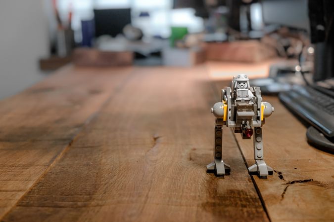 Lego robot figure on desk