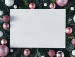 Pine tree branches with pink baubles and paper center