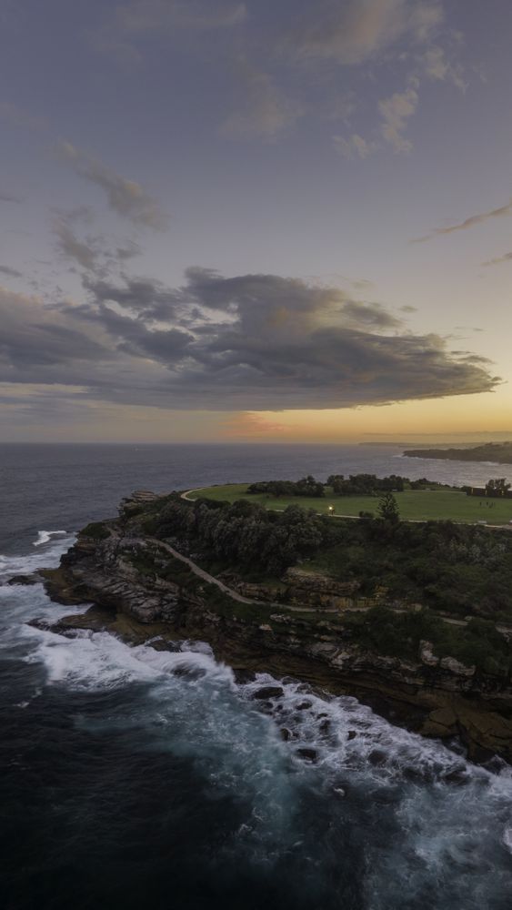 Landscape view of coastline at sunset