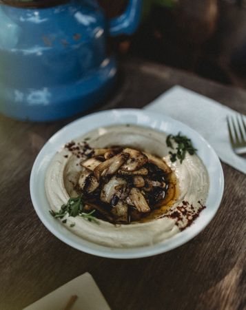 mushrooms hummus in plate
