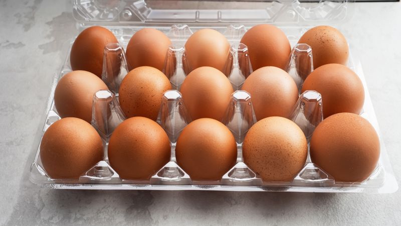 Organic chicken eggs in plastic packaging