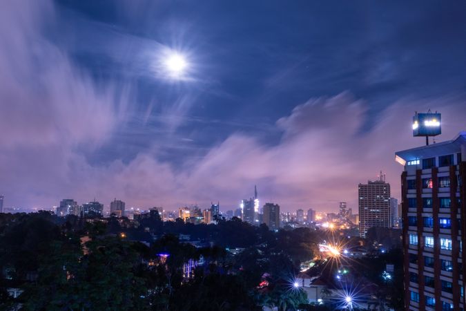 City with high rise buildings during night time in Nairobi, Kenya