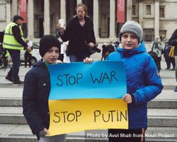 London, England, United Kingdom - March 5 2022: Two boys holding “stop war stop Putin” sign 4mngeb