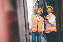 Import export workers between containers in PPE