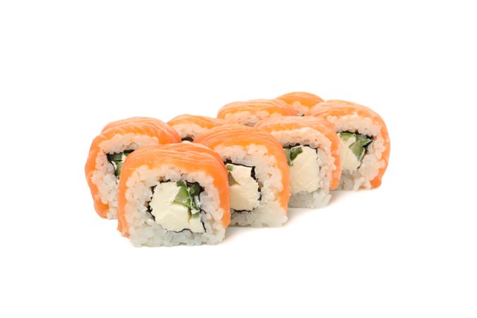 Japanese food. Delicious sushi rolls isolated on light background