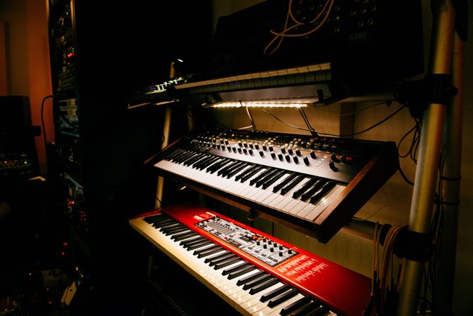 Synth keyboards in a dark studio
