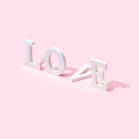 Love word on pink background