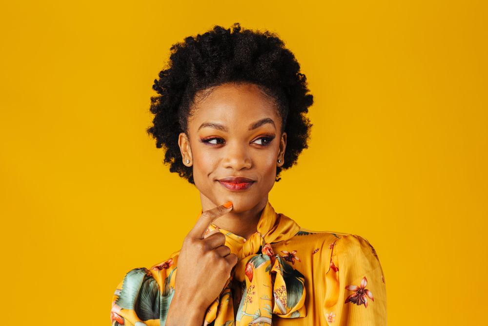 Beautiful Black woman making an inquisitive expression