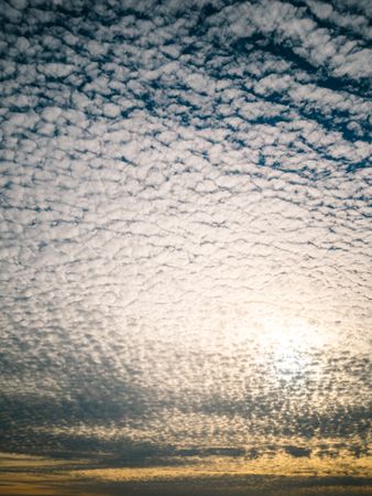 Picturesque cloudy sky at sundown