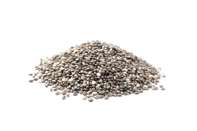 Heap of chia seeds isolated on blank background