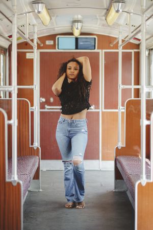 Cheerful woman in train car