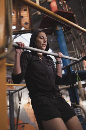 Athletic woman training in gym