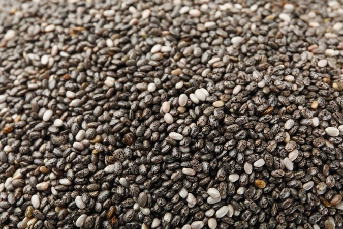 Chia seeds on whole background, close up