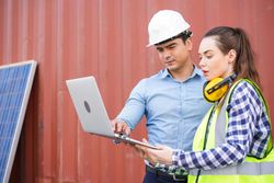 Two people planning on industrial warehouse