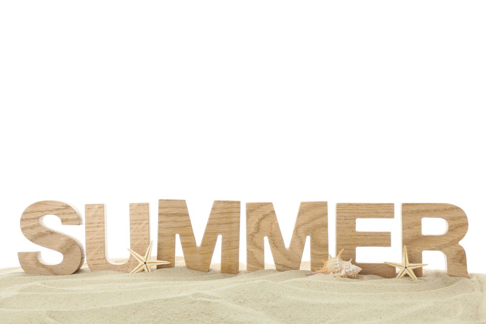 Starfish, seashell and inscription summer on clear sea sand. Happy holidays