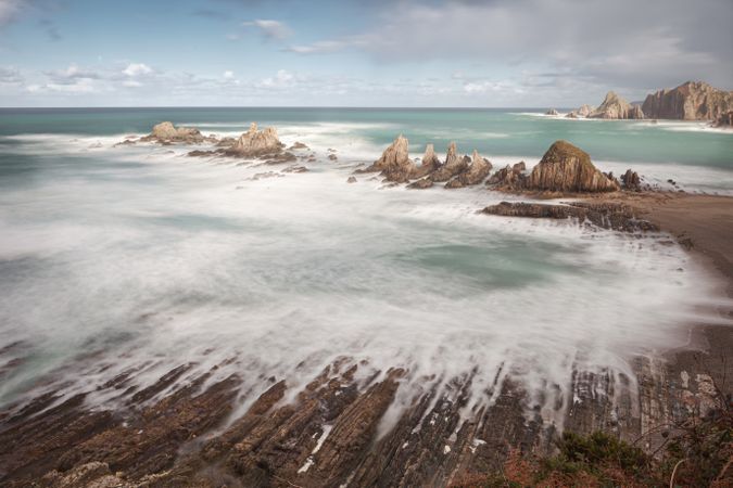 Wonderful ocean rocky coast in fair weather