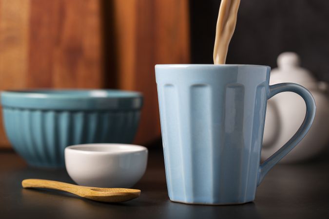 Cup of coffee with creamy milk.