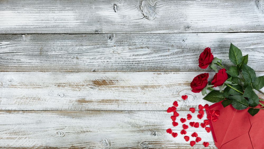 Valentine’s day concept on aged wood