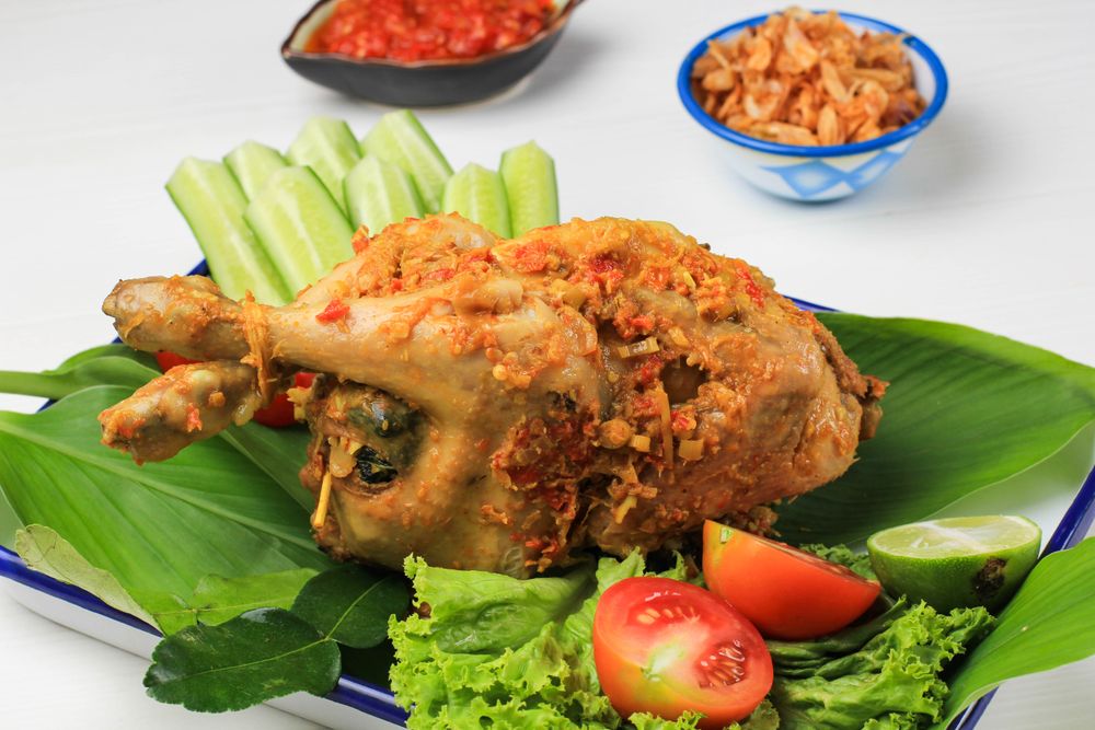 Balinese Roast Chicken Stuffed with Cassava Leaves.