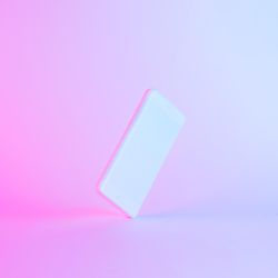 Smartphone painted light paint with vibrant bold gradient purple and blue holographic color lights