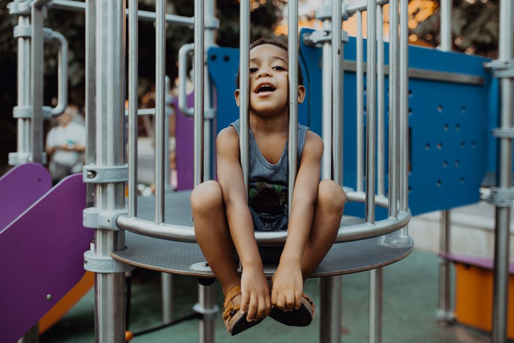 Funny Black boy on playground