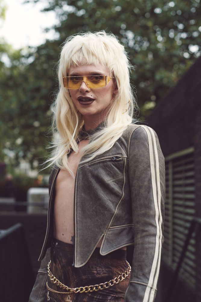 London, England, United Kingdom - September 18 2021: Person in blond wig, biker jacket, chain belt