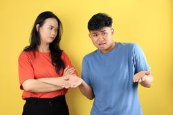 Young Asian Couple, the Woman Angry While the Man Nothing Idea