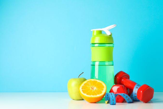Loss weight accessories on table against blue background