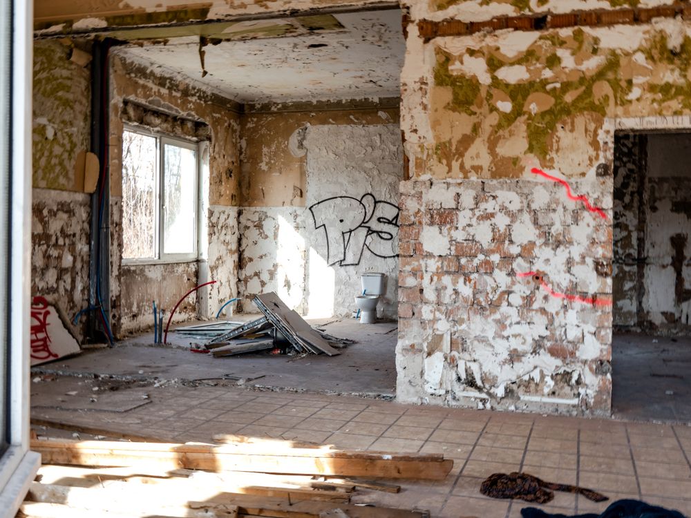 Old port, abandoned buildings, bridges, graffiti on the walls of houses in Strasbourg