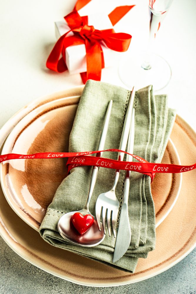 Valentine's Day themed table setting with heart and gift