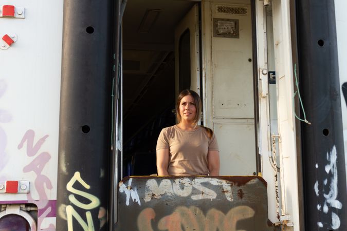 Female soldier in military vehicle