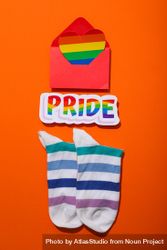 Pride parade concept, symbols on orange background. 4NE7re
