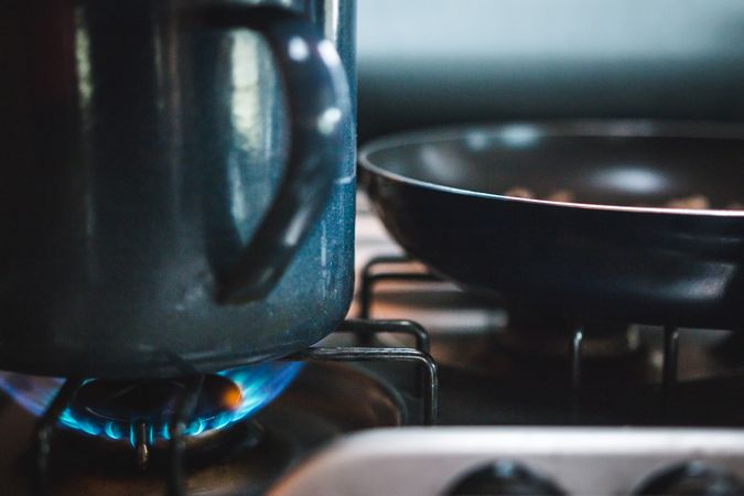 Kitchenware heating on gas stove