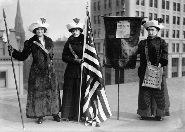Suffragettes with flag at Opera House, Brooklyn Academy of Music, NYC