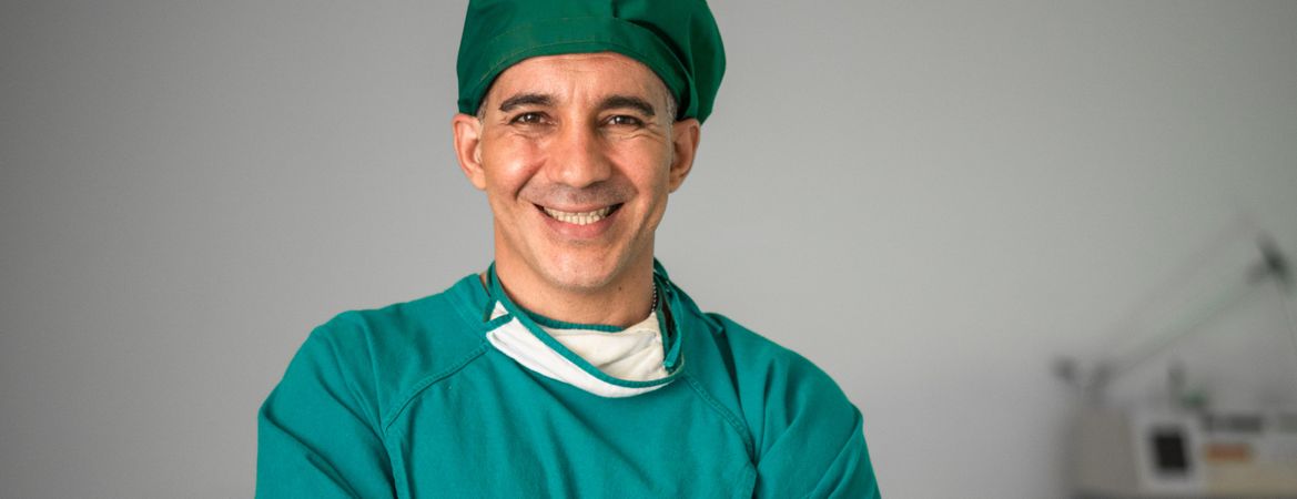 Portrait of a happy professional surgeon