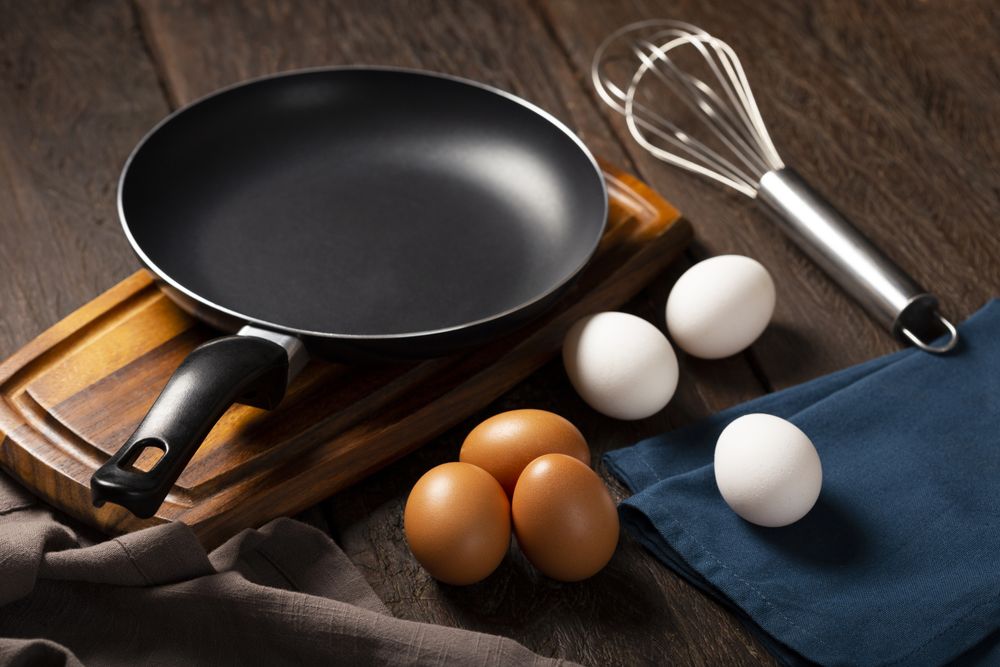 Chicken eggs go up on the table.