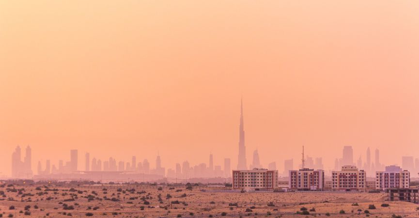 Hazy sky over city in desert
