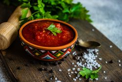 Bowl of traditional Georgian sauce - satsebeli