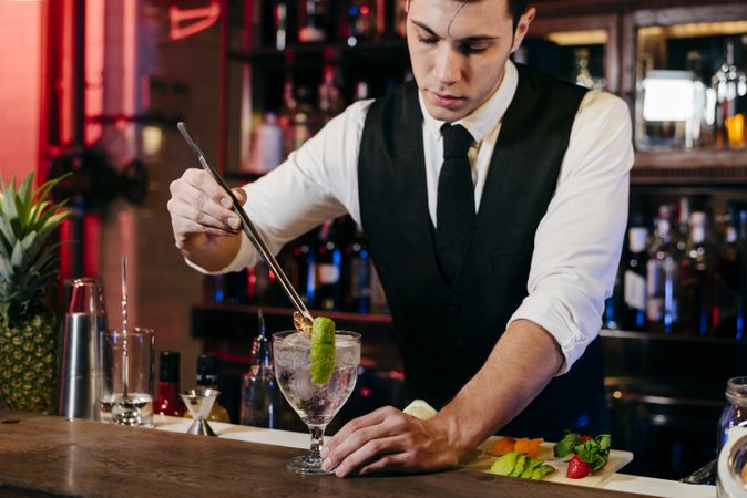 Barman working making drinks