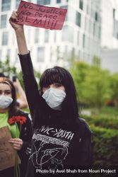 London, England, United Kingdom - June 6th, 2020: Young woman holding “No Justice No Peace” sign 4Az7Wb