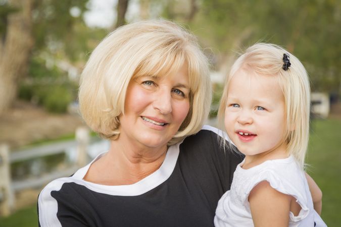 Grandmother and Granddaughter Playing At The Park