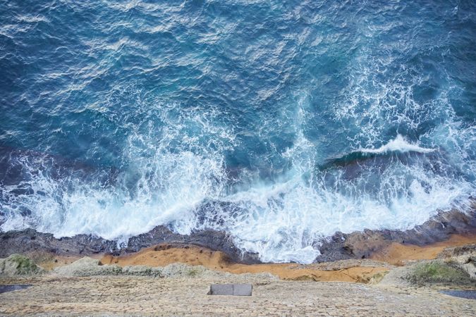 Beautiful blue sea under big mountain
