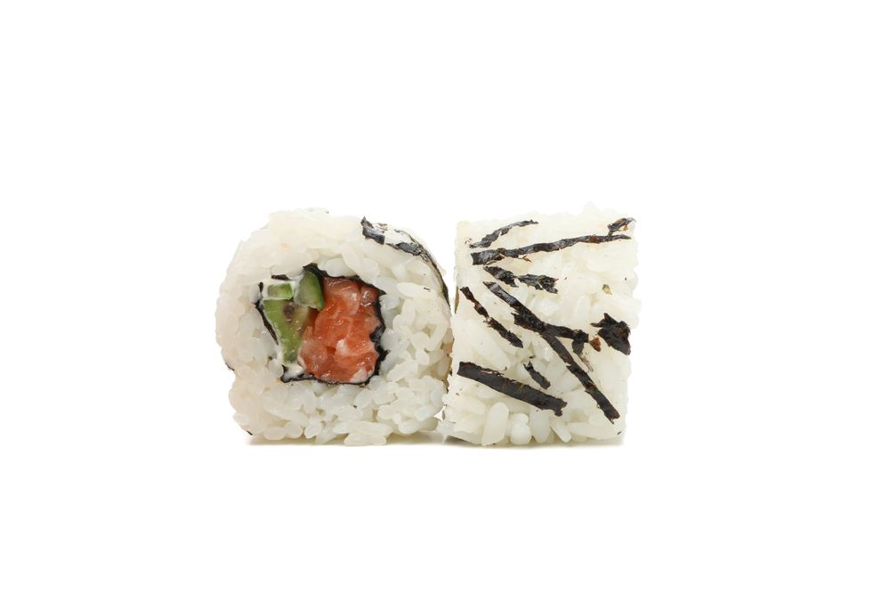 Japanese food. Delicious sushi rolls isolated on light background