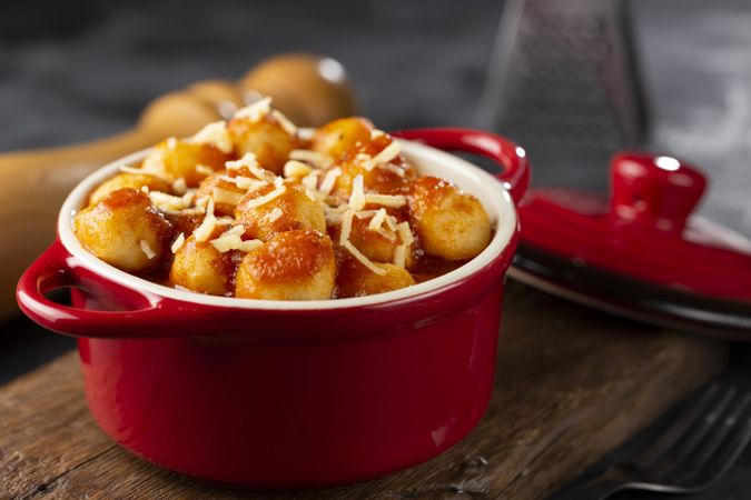 Gnocchi with tomato sauce and grated Parmesan cheese.