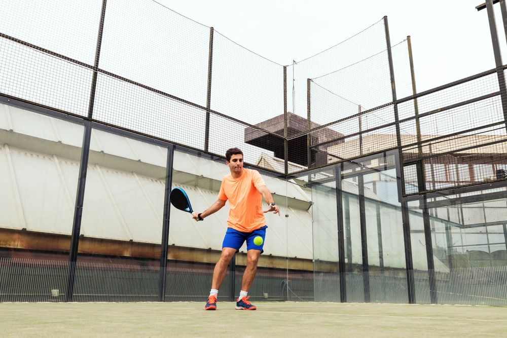 Young man playing paddle tennis