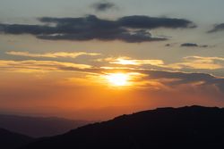 Beautiful bright sunset in mountains