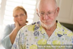 Older Adult Couple in Dispute or Consoling beXGRK